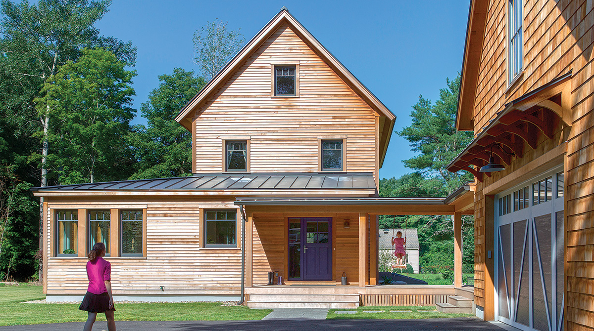 detached garage next to modern farmhouse
